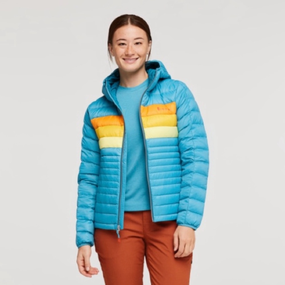 Cotopaxi Blue Jacket with Orange and Yellow Stripes
